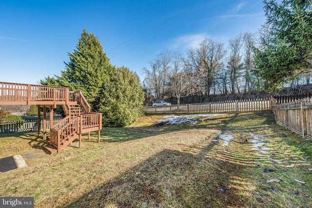 view of yard featuring a deck