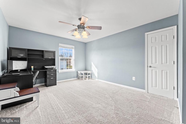 office area featuring carpet and ceiling fan