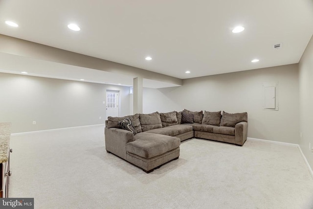 carpeted living room featuring recessed lighting, visible vents, and baseboards