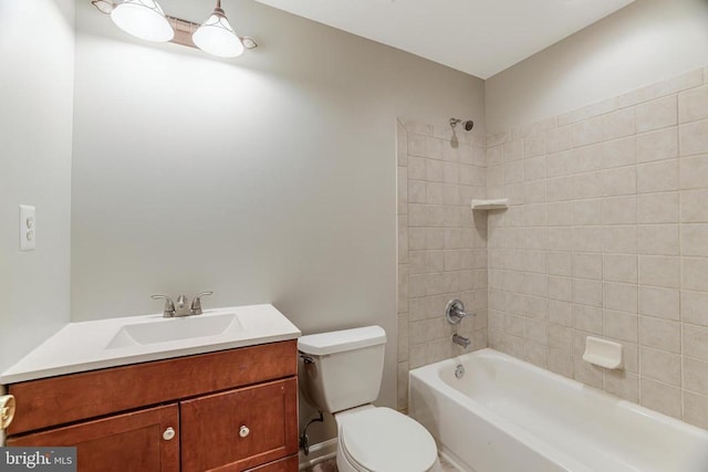 bathroom with  shower combination, vanity, and toilet