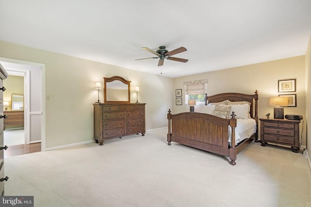 bedroom featuring baseboards, carpet floors, and ceiling fan