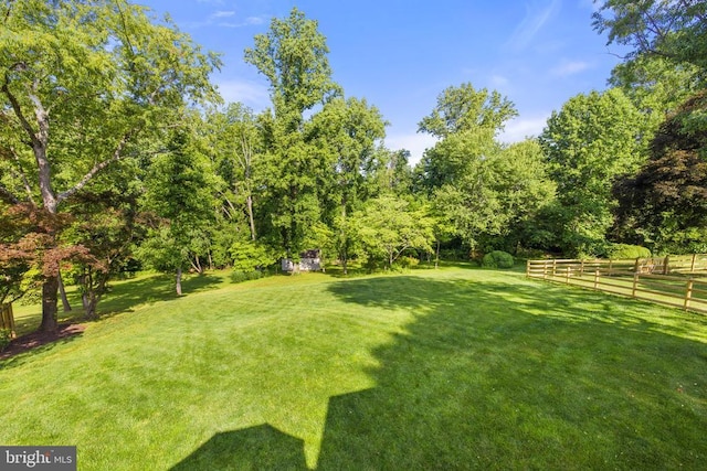 view of yard with fence