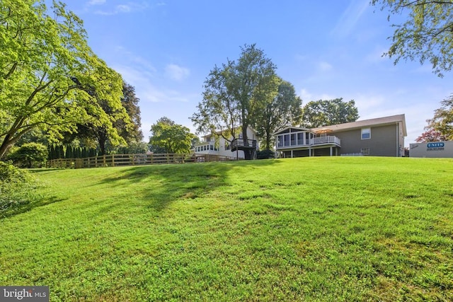 view of yard featuring fence