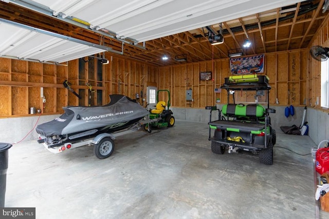 garage featuring a garage door opener