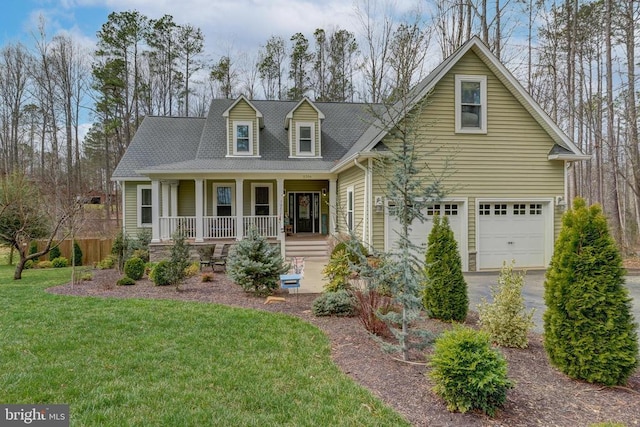 cape cod home with a garage, driveway, a porch, and a front yard