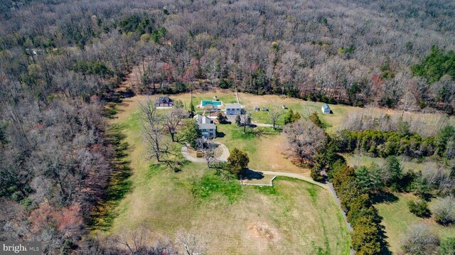 drone / aerial view with a forest view