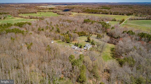 birds eye view of property featuring a rural view