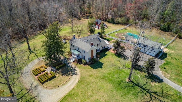 bird's eye view featuring a forest view