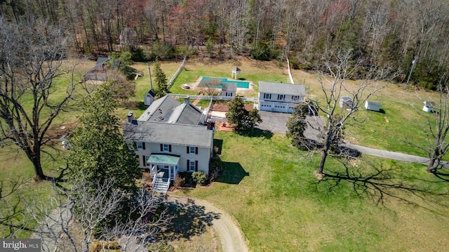 aerial view featuring a view of trees