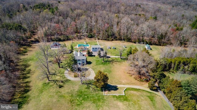 drone / aerial view with a forest view