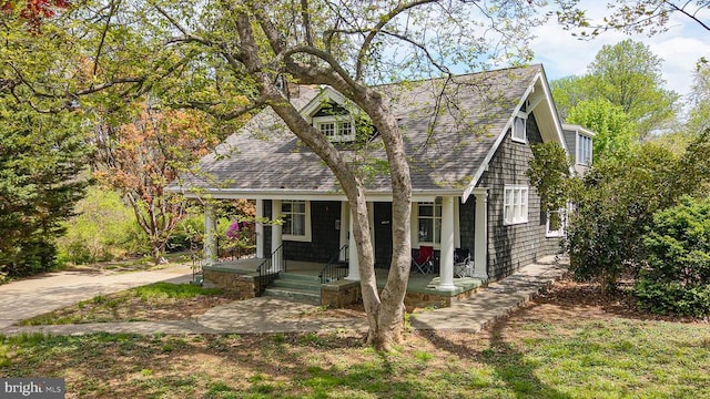 535 Winchester St, Warrenton, VA 20186 - cape cod home with roof with shingles and covered porch