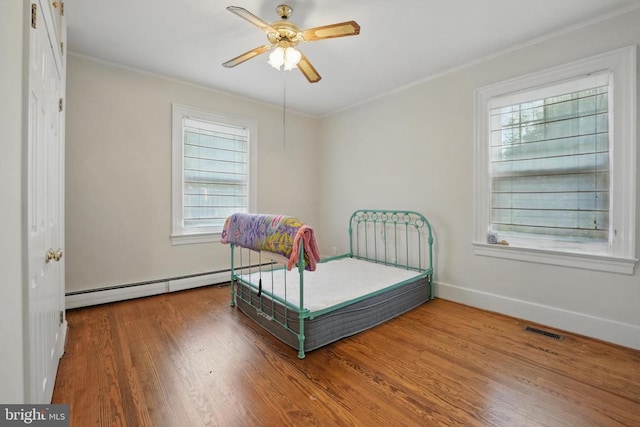 535 Winchester St, Warrenton, VA 20186 - bedroom with crown molding, multiple windows, and visible vents