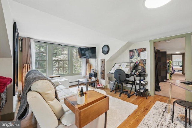 535 Winchester St, Warrenton, VA 20186 - living room with a baseboard heating unit and wood finished floors