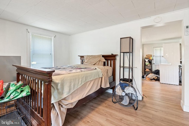 bedroom with light wood-style floors