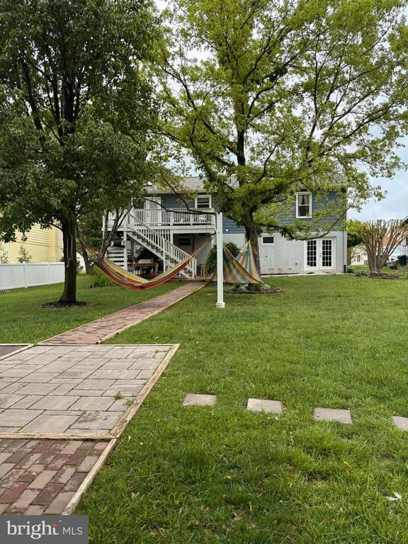  - view of yard with stairs and french doors