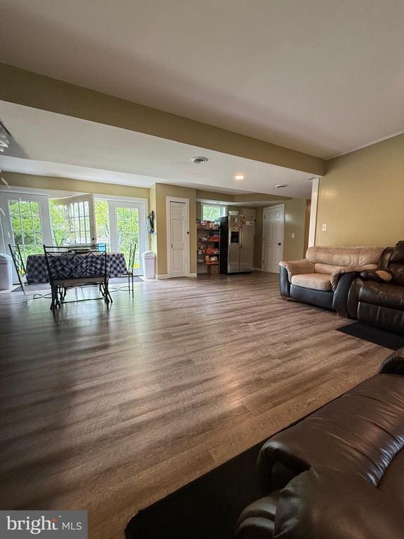  - living room with wood finished floors and recessed lighting