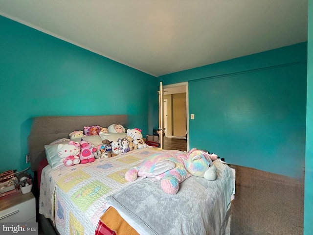  - bedroom featuring carpet flooring