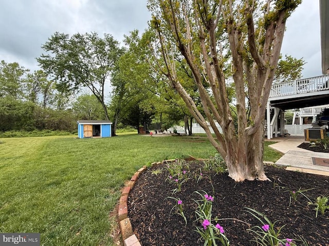  - view of green lawn with a deck and stairway