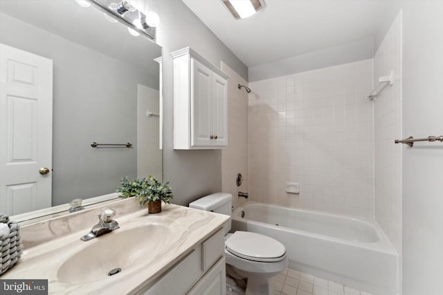 full bath with toilet,  shower combination, tile patterned flooring, and vanity
