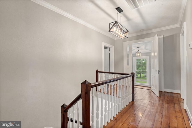 105 E Washington St, Remington, VA 22734 - corridor featuring an upstairs landing, hardwood / wood-style flooring, and crown molding
