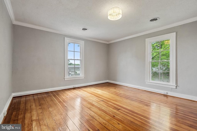 105 E Washington St, Remington, VA 22734 - spare room featuring hardwood / wood-style flooring, ornamental molding, and a textured ceiling