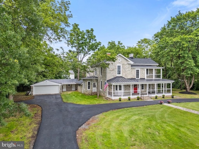 105 E Washington St, Remington, VA 22734 - view of front of property with a standing seam roof, covered porch, a front yard, a chimney, and a metal roof