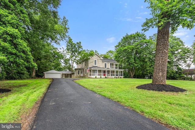 105 E Washington St, Remington, VA 22734 - traditional home featuring a front lawn and a garage