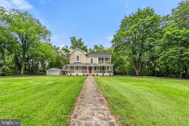 105 E Washington St, Remington, VA 22734 - view of front of home with a porch, a front lawn, and a garage