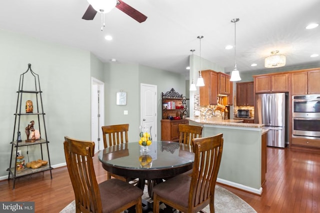 6020 E Greenbrier River Rd E, Fredericksburg, VA 22407 - dining space with recessed lighting, dark wood finished floors, a ceiling fan, and baseboards
