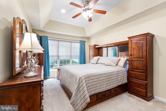 6020 E Greenbrier River Rd E, Fredericksburg, VA 22407 - bedroom featuring light carpet, a ceiling fan, and a raised ceiling