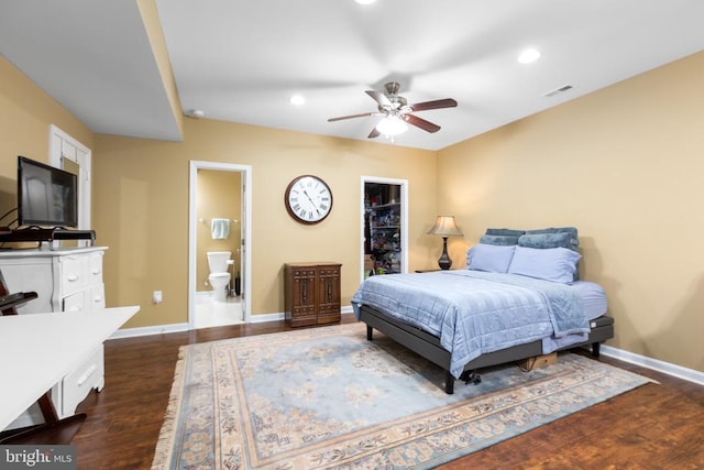 6020 E Greenbrier River Rd E, Fredericksburg, VA 22407 - bedroom featuring baseboards, a walk in closet, dark wood finished floors, recessed lighting, and ensuite bathroom