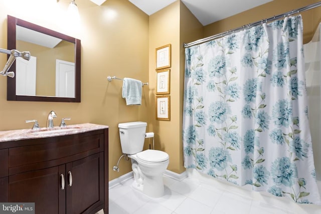 6020 E Greenbrier River Rd E, Fredericksburg, VA 22407 - bathroom with toilet, vanity, baseboards, tile patterned floors, and curtained shower