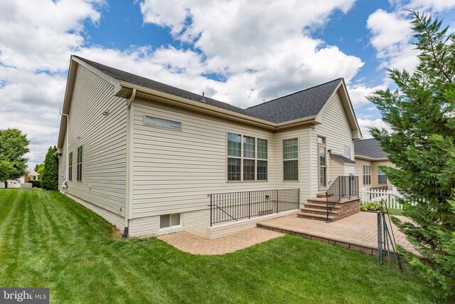 6020 E Greenbrier River Rd E, Fredericksburg, VA 22407 - rear view of property with a patio and a yard