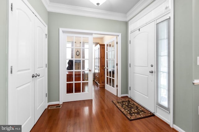 6020 E Greenbrier River Rd E, Fredericksburg, VA 22407 - foyer with wood finished floors, crown molding, baseboards, and french doors