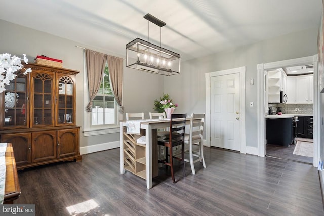 404 N Franklin St, Remington, VA 22734 - dining room with a chandelier and dark wood-style flooring