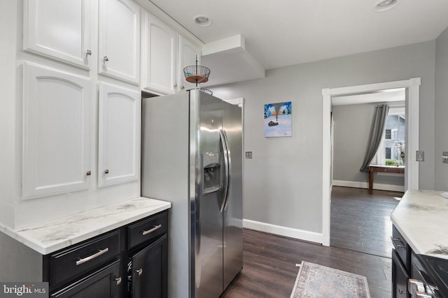 404 N Franklin St, Remington, VA 22734 - kitchen with stainless steel fridge, white cabinetry, dark wood finished floors, and dark cabinets