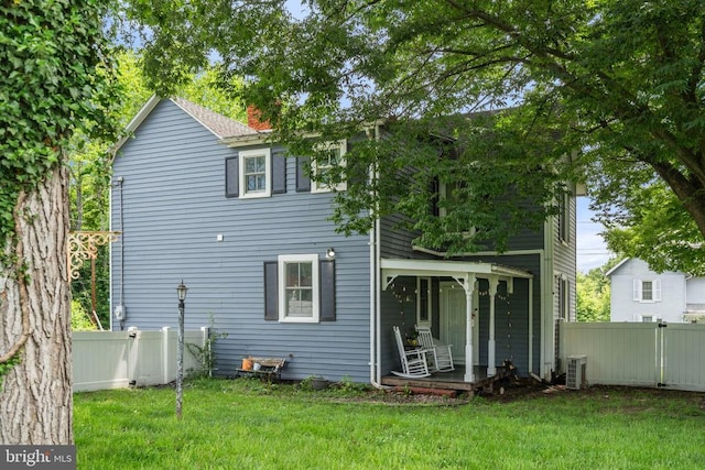 404 N Franklin St, Remington, VA 22734 - back of property with a fenced backyard and a chimney