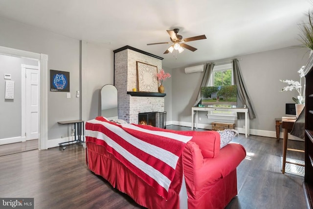 404 N Franklin St, Remington, VA 22734 - living room featuring a wall mounted air conditioner, ceiling fan, a brick fireplace, and wood finished floors