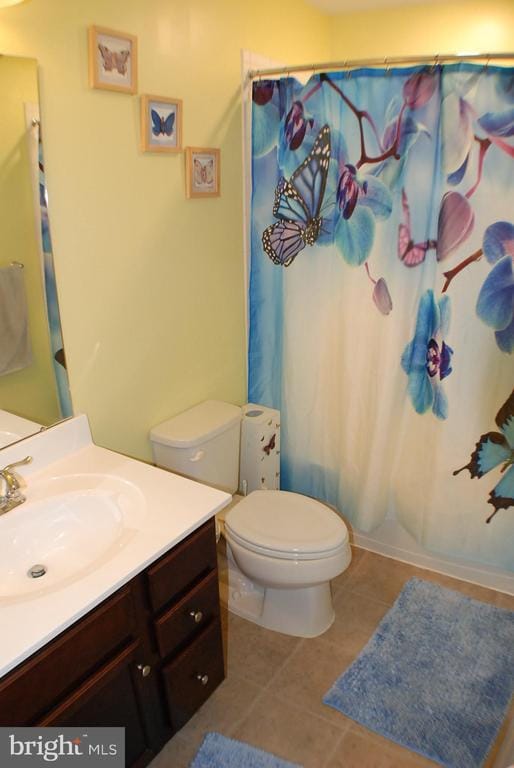 - bathroom with vanity, tile patterned flooring, and a shower with shower curtain