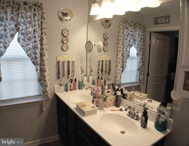  - full bathroom featuring double vanity