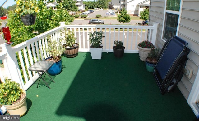  - balcony featuring a residential view