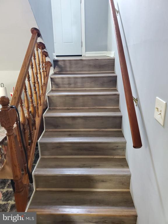  - stairs with wood finished floors
