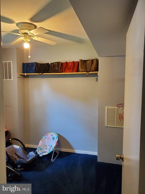  - unfurnished bedroom with carpet flooring and ceiling fan