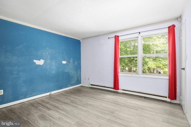 221 Hampton Dr, Spotsylvania, VA 22551 - spare room featuring baseboard heating, wood finished floors, and ornamental molding