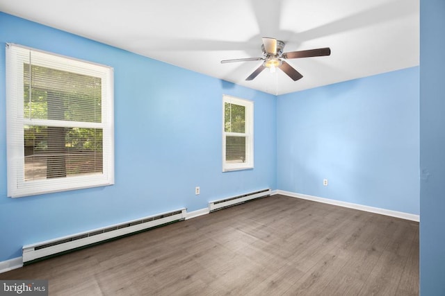 221 Hampton Dr, Spotsylvania, VA 22551 - spare room featuring baseboard heating, wood finished floors, and ceiling fan
