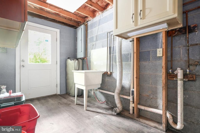 221 Hampton Dr, Spotsylvania, VA 22551 - basement with wood finished floors and a sink