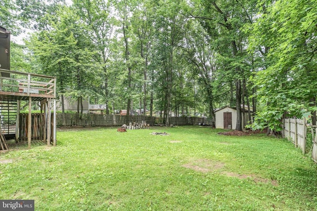 221 Hampton Dr, Spotsylvania, VA 22551 - fenced backyard featuring a storage shed and a deck
