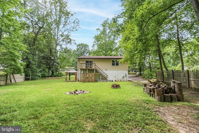 221 Hampton Dr, Spotsylvania, VA 22551 - view of yard featuring a fire pit and stairway