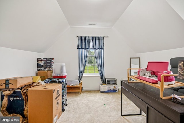  - office space with carpet floors and lofted ceiling