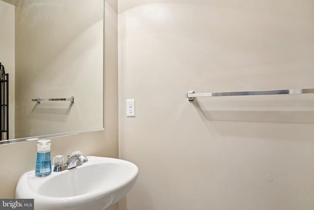  - bathroom featuring a sink